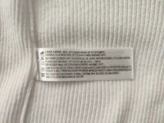 Chaquetita de punto blanca de Massimo Dutti