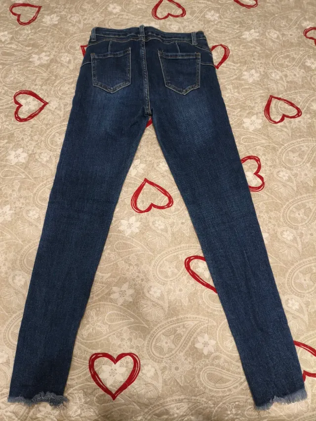 Jeans blu strappati