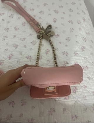 Bolso bandolera rosa y monedero a juego