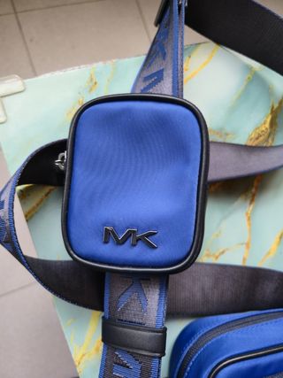 Bandolera Michael Kors azul con monedero