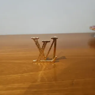 Fibbia Louis Vuitton Oro