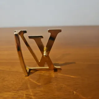 Fibbia Louis Vuitton Oro