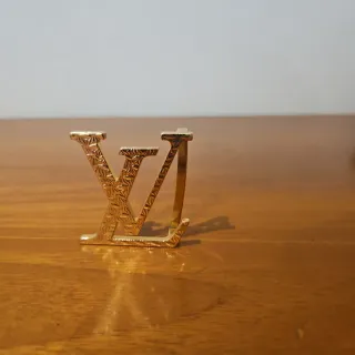 Fibbia Louis Vuitton Oro