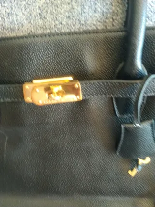 Borsa Hermès nera e dorata