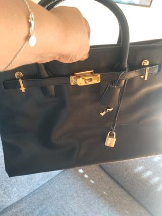 Borsa Hermès nera e dorata