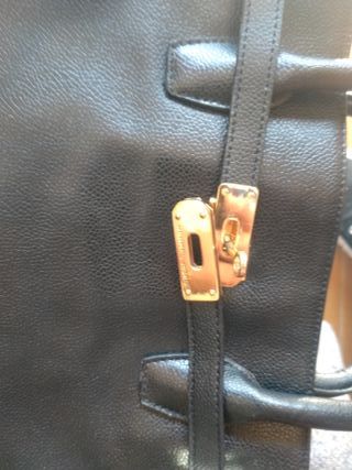 Borsa Hermès nera e dorata