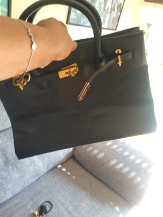 Borsa Hermès nera e dorata