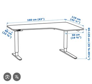 Escritorio de oficina IKEA con sillón gamer.