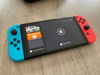 Nintendo Switch OLED blu/rosso