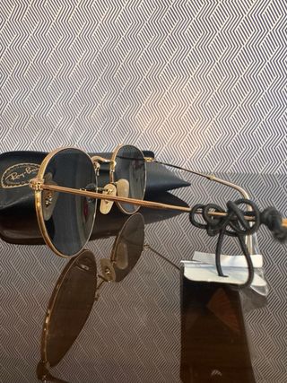 Gafas de sol Ray-Ban doradas modelo RB3447 001