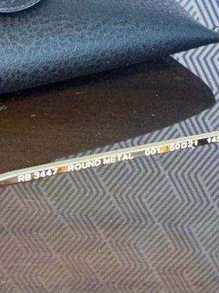 Gafas de sol Ray-Ban doradas modelo RB3447 001