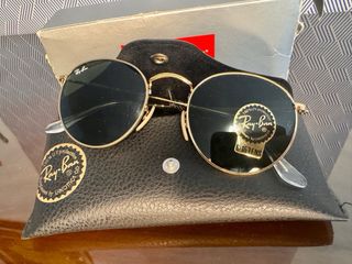 Gafas de sol Ray-Ban doradas modelo RB3447 001