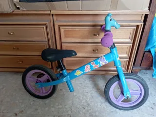 Bicicleta sin pedales azul dinosaurios