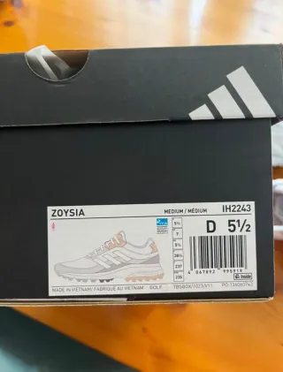 Zapatos de golf Adidas blancos y rosas