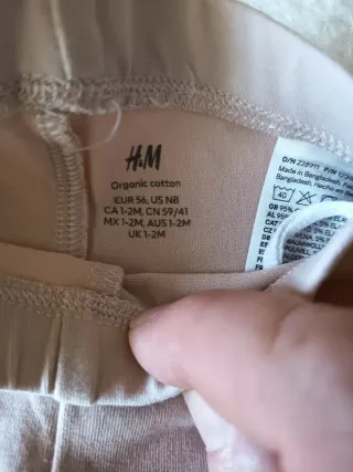 Calças H&M para bebé com padrão floral