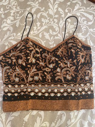 Corsé con abalorios negro y dorado