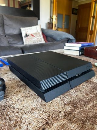 Consola PS4 con 2 mandos y 3 juegos