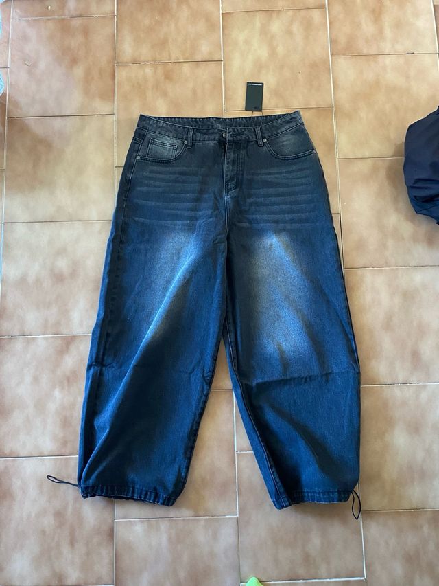 Vaqueros negros anchos con cordón