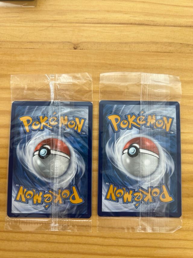Carte sigillate promozionali Pokemon Ogerpon e Pecharunt