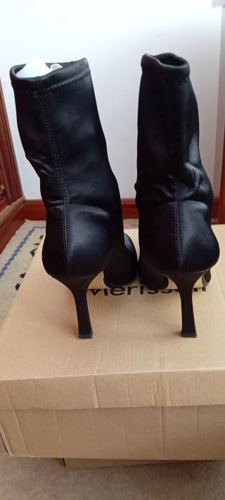Botas altas negras de tacón