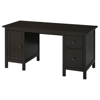 Escritorio de madera negro con cajones y puerta