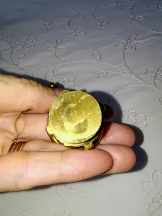 Mortero y mano de bronce antiguo