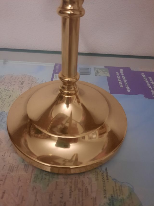 Espejo de aumento dorado