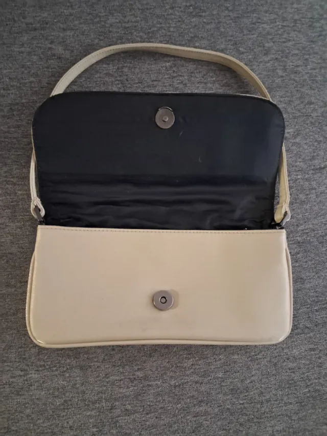 Bolso de mano bordado beige y multicolor