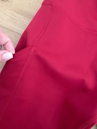 Leggings Nike rojos con bolsillos