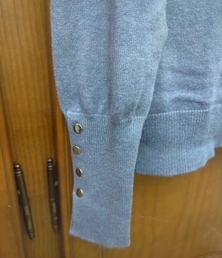 Jersey gris cuello alto