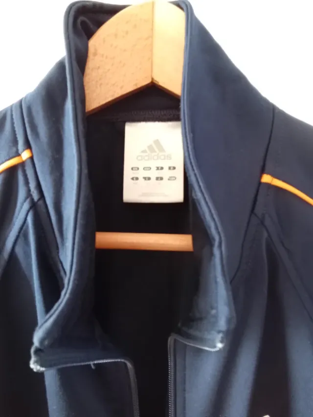 Chaqueta Adidas azul y naranja