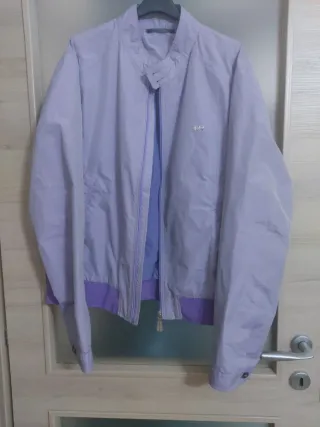 Giubbino viola di petto misura 60cm di spalle 50cm