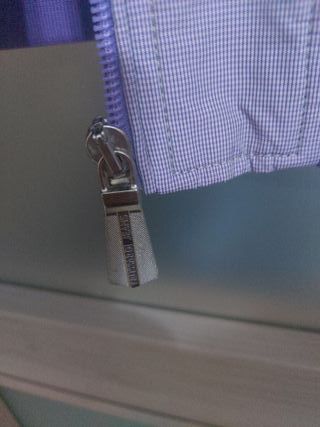 Giubbino viola di petto misura 60cm di spalle 50cm