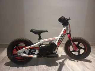 Bici Eléctrica  4MX 12 pugadas + mando desconexion