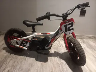 Bici Eléctrica  4MX 12 pugadas + mando desconexion