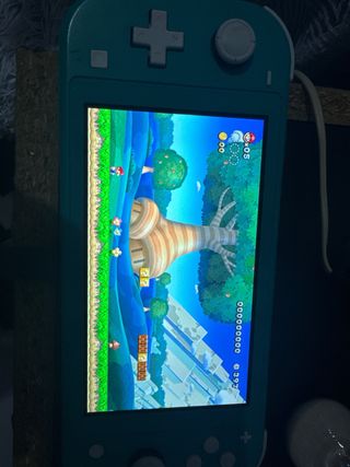Nintendo Switch Lite Verde + Juego Mario Bros U De