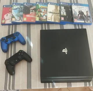 Consola PS4 Pro Negra + 7 Juegos