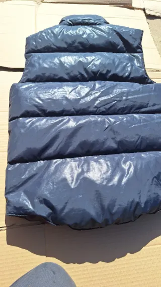 Chaleco reversible de plumas azul