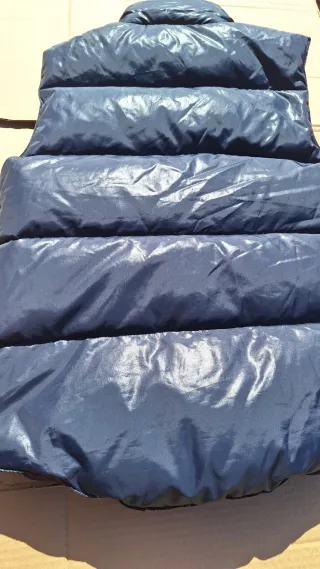 Chaleco reversible de plumas azul