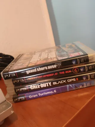 PS3 Slim Plata 500GB + Mando + 4 Juegos + cables