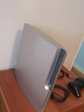 PS3 Slim Plata 500GB + Mando + 4 Juegos + cables