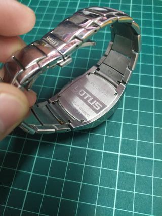 Reloj Lotus Quartz Naranja y Plateado