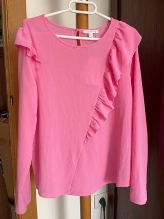 Blusa rosa con volantes
