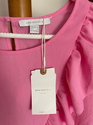 Blusa rosa con volantes