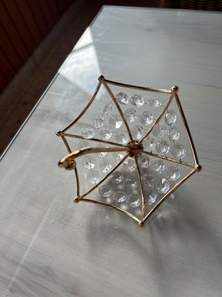 Figura paraguas cristal dorado