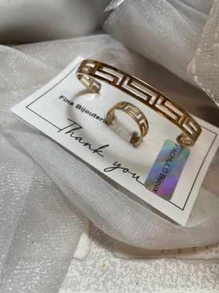 Brazalete y anillo abierto