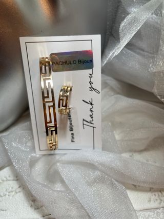 Brazalete y anillo abierto