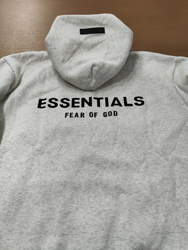 Sudadera Fear of God Essentials Gris