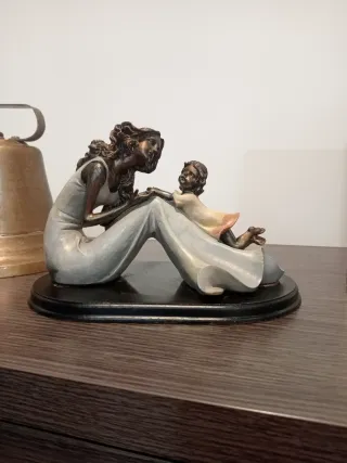 Figura cerámica y metal madre e hijo