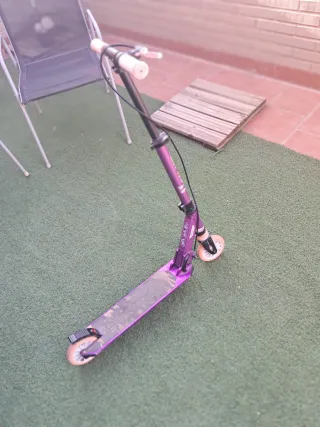 Patinete morado Decathlon